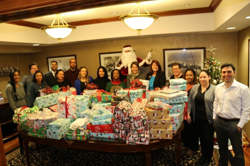 Perecman staff with gifts