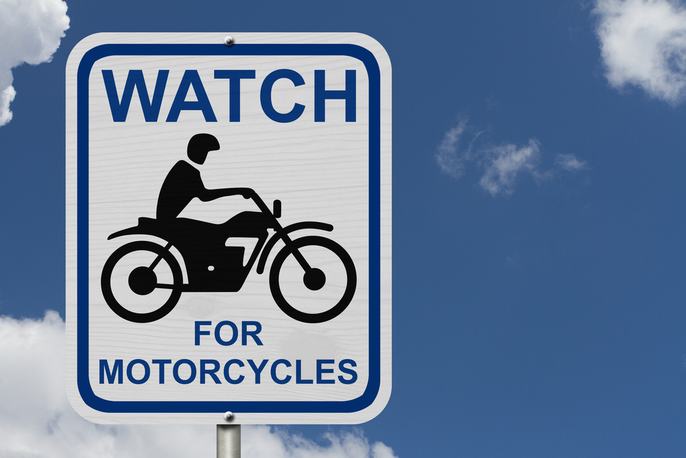 watch for motorcycles sign