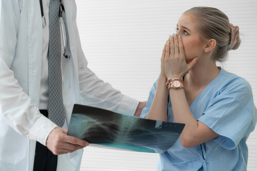 patient reviewing medical report