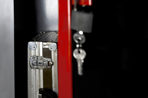 close-up of lock system and key hanging from lock