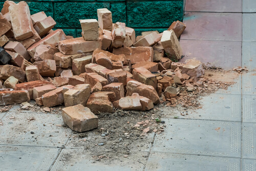 a pile of construction debris on the ground