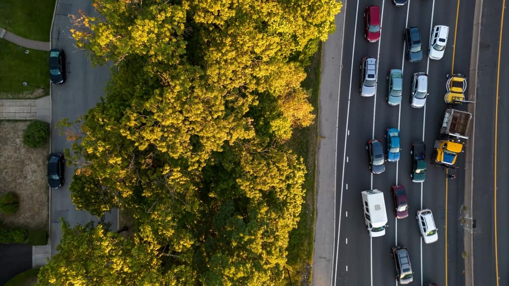 aerial view of a Jericho highway with cars avoiding a car wreck