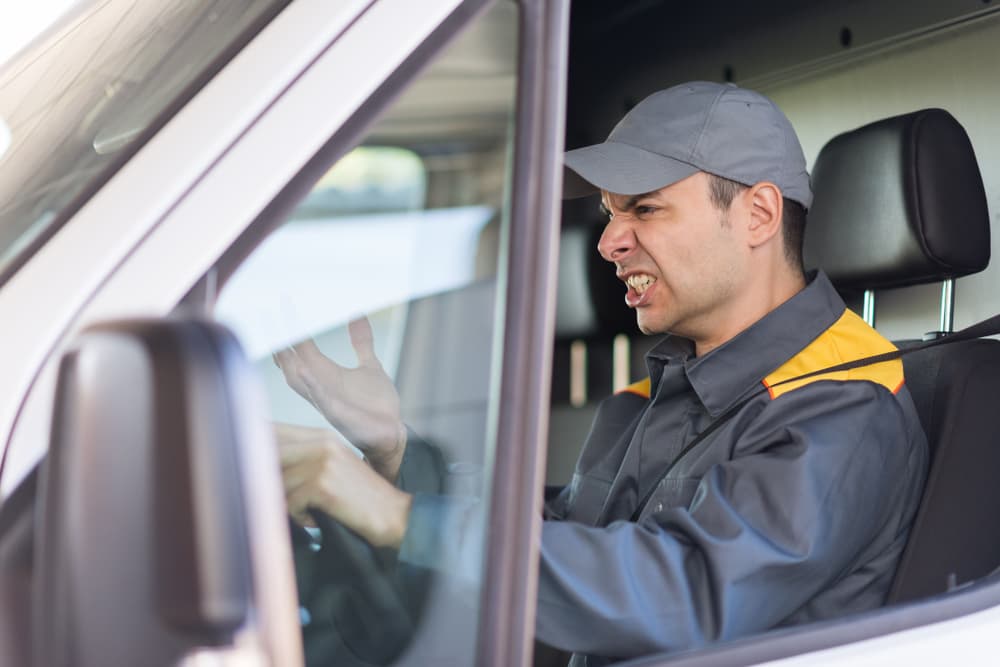 aggravated driver in NYC traffic, stay alert when driving next reckless drivers.