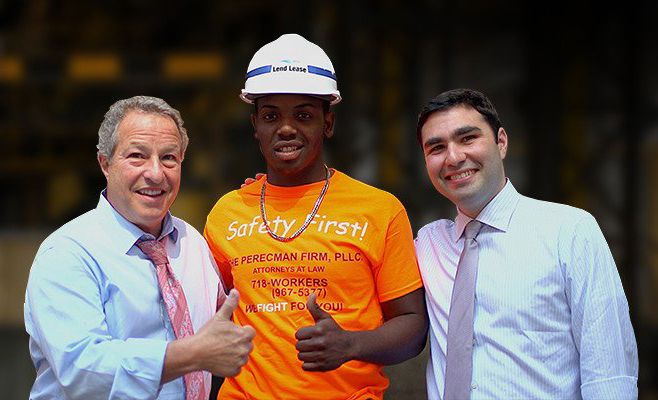 David and Zach Perecman standing with a construction worker of NYC