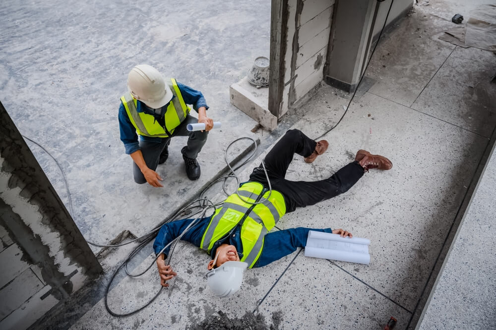 engineer or electrician is electrocuted to the ground.